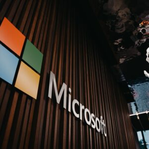 Interior view of Microsoft office with logo on wooden wall in Brussels, Belgium.